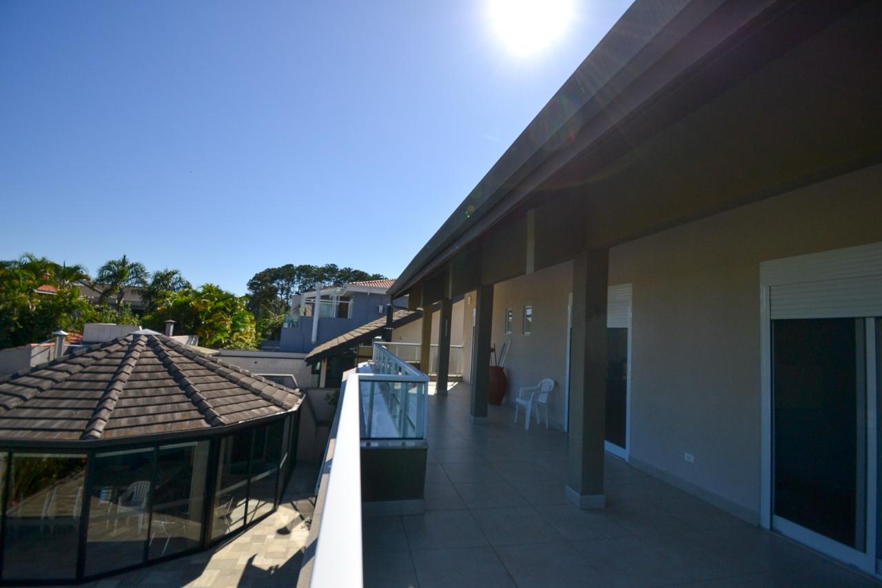 Foto 17 de Casa à venda em Alphaville com 2 Lotes | 850m² de Terreno | 4 suítes | Pomar | Área Gourmet | Alpha DL