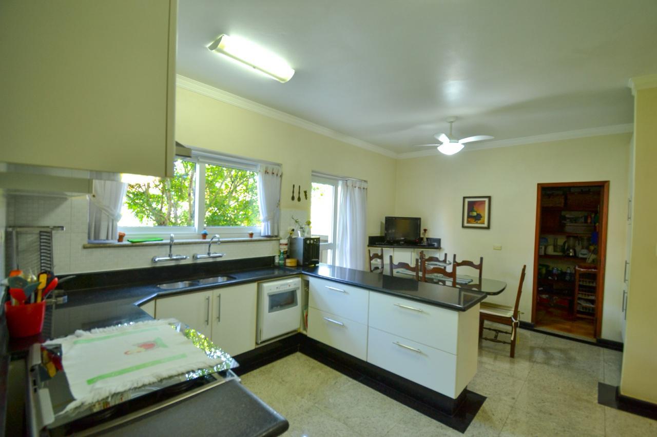 Foto 16 de Casa à venda em Alphaville com 2 Lotes | 850m² de Terreno | 4 suítes | Pomar | Área Gourmet | Alpha DL