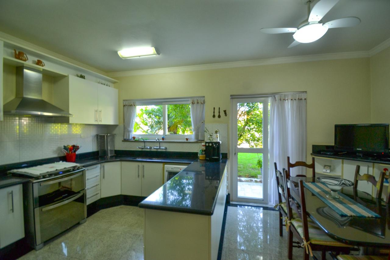 Foto 8 de Casa à venda em Alphaville com 2 Lotes | 850m² de Terreno | 4 suítes | Pomar | Área Gourmet | Alpha DL