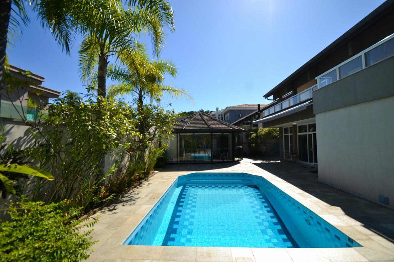 Foto 6 de Casa à venda em Alphaville com 2 Lotes | 850m² de Terreno | 4 suítes | Pomar | Área Gourmet | Alpha DL